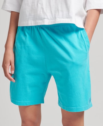 Regular Pantalon de sport 'Code Essential' Superdry en bleu : devant