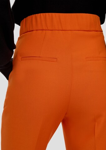 s.Oliver BLACK LABEL Tapered Bügelfaltenhose in Orange