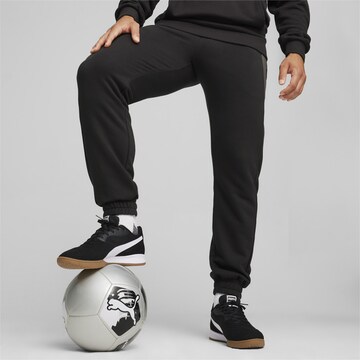 PUMA Tapered Sporthose 'KING' in Schwarz: Vorderseite