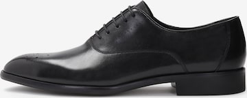 Kazar Lace-Up Shoes in Black: front