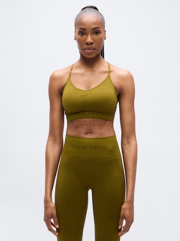 NIKE - Soutien Bustier Soutien de desporto em verde: frente