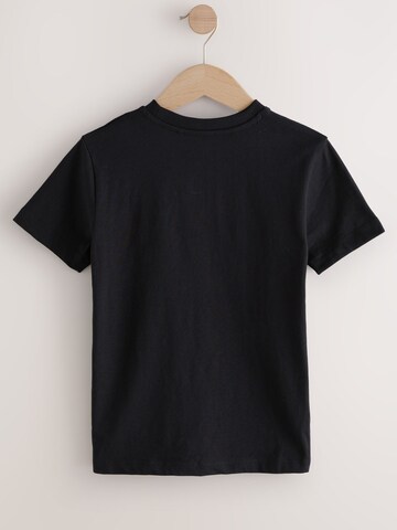 Next - Camiseta 'NASA' en negro