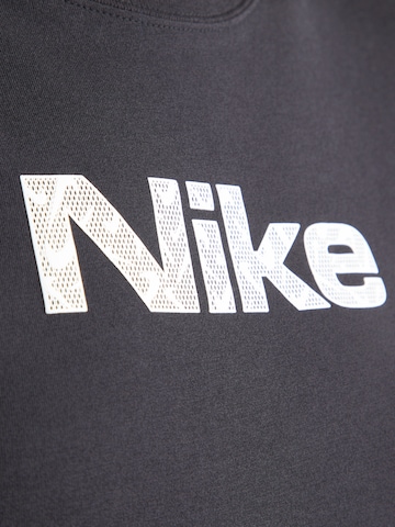 Nike Sportswear - Camisa 'Chill Knit' em preto