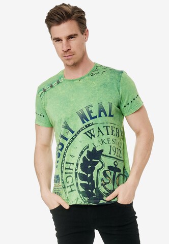 Rusty Neal Cooles T-Shirt mit großem Print in Grün: predná strana