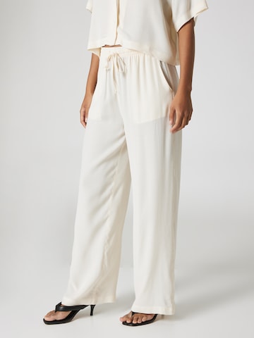 A LOT LESS Wide leg Trousers 'Leila' in Beige: front