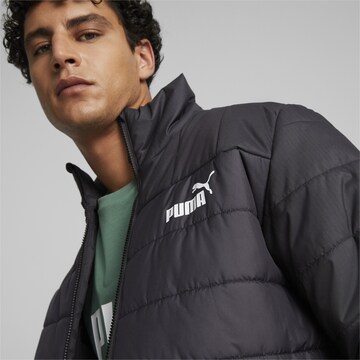 PUMA Funktionsjacke 'Essentials+' in Schwarz