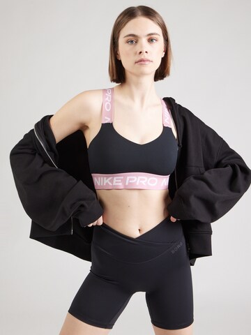 NIKE Bustier Biustonosz sportowy w kolorze czarny: przód