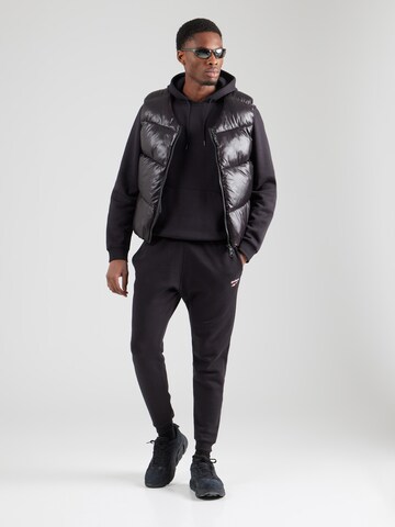 Reebok Spordidressipluusid 'IDENTITY', värv must