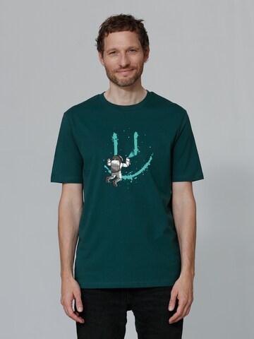 Maglietta ' Graffiti Astronaut ' di Watapparel in verde: frontale