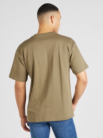 NORSE PROJECTS - Camiseta 'Simon' en verde