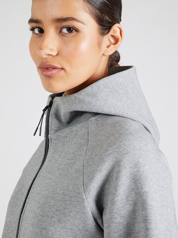 Veste de survêtement 'TECH FLEECE' Hummel en gris