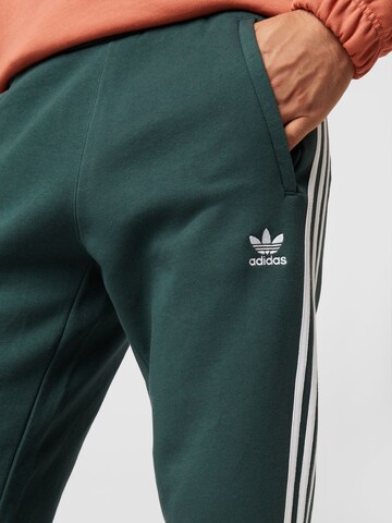 Tapered Pantaloni 'Adicolor' di ADIDAS ORIGINALS in verde