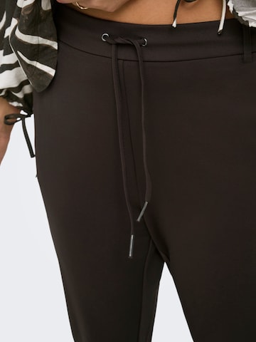 ONLY Carmakoma Дънки Tapered Leg Панталон 'CARGOLDTRASH CLASSIC' в кафяво