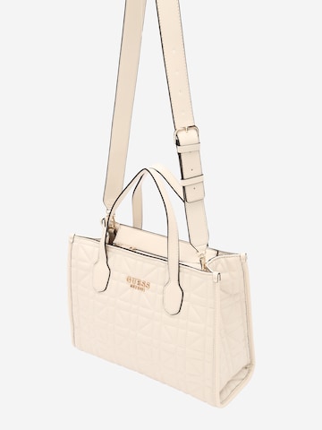 Guess cream handbag sale