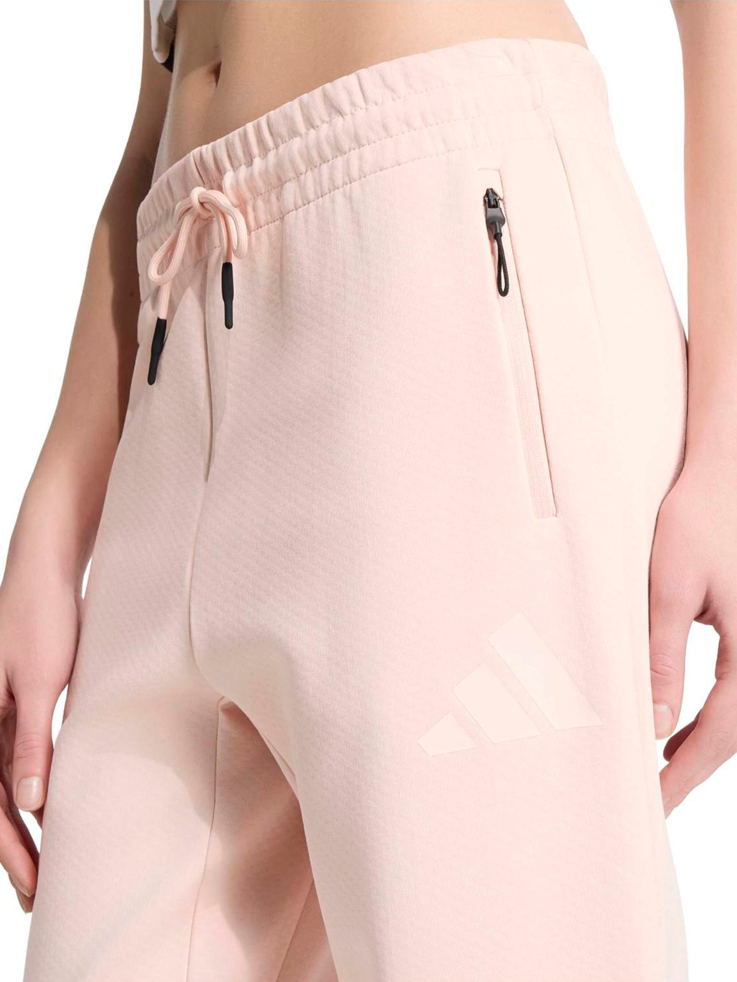 ADIDAS SPORTSWEAR Zwężany krój Spodnie sportowe 'Z.N.E.' w kolorze różowy