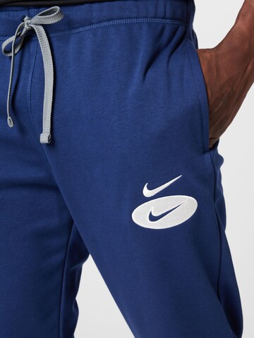 Nike Sportswear Zúžený Kalhoty – modrá