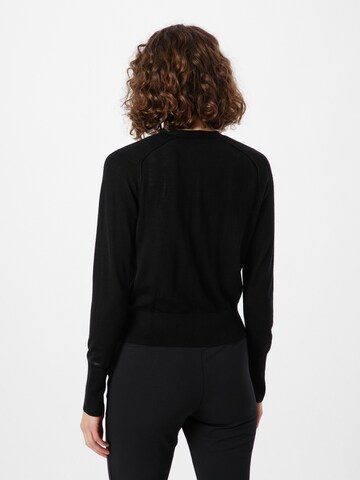 Geacă tricotată de la Calvin Klein pe negru