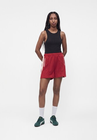 PUMA - Loosefit Calças de desporto 'T7' em rosa