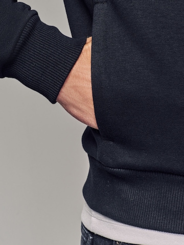 Next - Sudadera con cremallera en negro