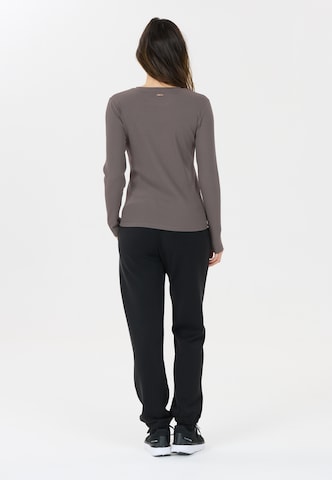 Athlecia Functioneel shirt 'Lankae' in Bruin