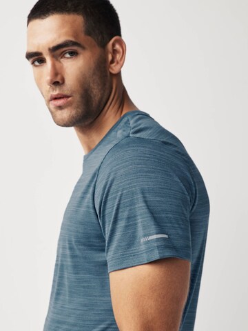 T-Shirt fonctionnel Next en bleu