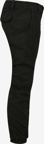 Tapered Pantaloni di Urban Classics in nero