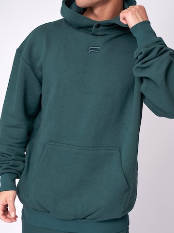 Fortex Fitness Trui 'Essential Oversized Hoodie' in Groen
