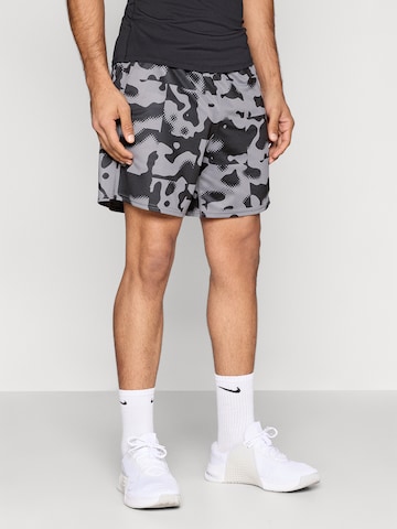 regular Pantaloni sportivi 'FLEX' di NIKE in grigio: frontale