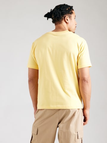 T-Shirt 'Essentials' new balance en jaune