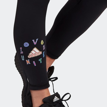 ADIDAS SPORTSWEAR Skinny Urheiluhousut 'Love Unites Believe' värissä musta