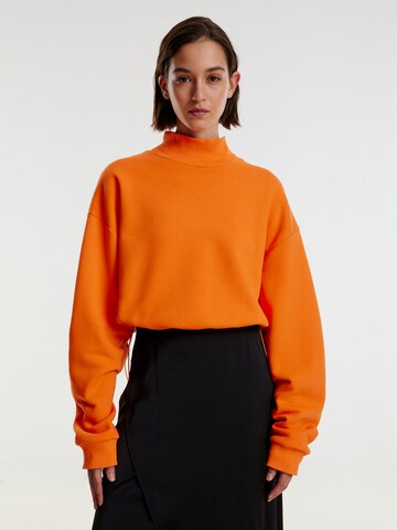 EDITED Sweatshirt 'Ayaka' in Oranje: voorkant