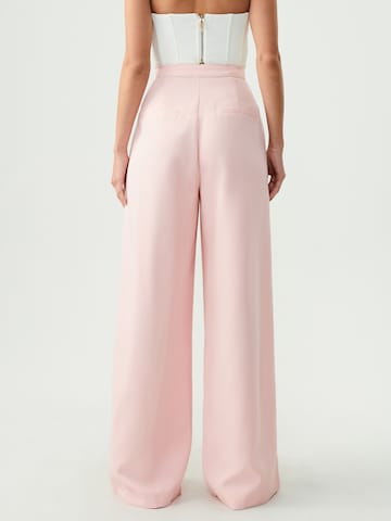 Wide Leg Pantalon BWLDR en rose : derrière