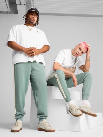 PUMA Tapered Broek 'T7 ALWAYS ON' in Groen: voorkant