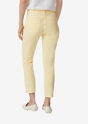 Coupe slim Jean COMMA en jaune : derrière