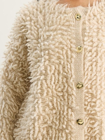 Cardigan Bianco Lucci en beige