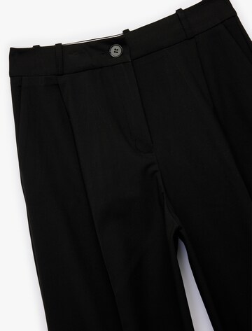 Koton Wide Leg Bundfaltenhose in Schwarz