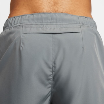 NIKE Regular Workout Pants in Grey