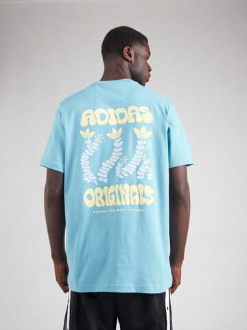 zils ADIDAS ORIGINALS T-Krekls 'FLORA': no priekšpuses