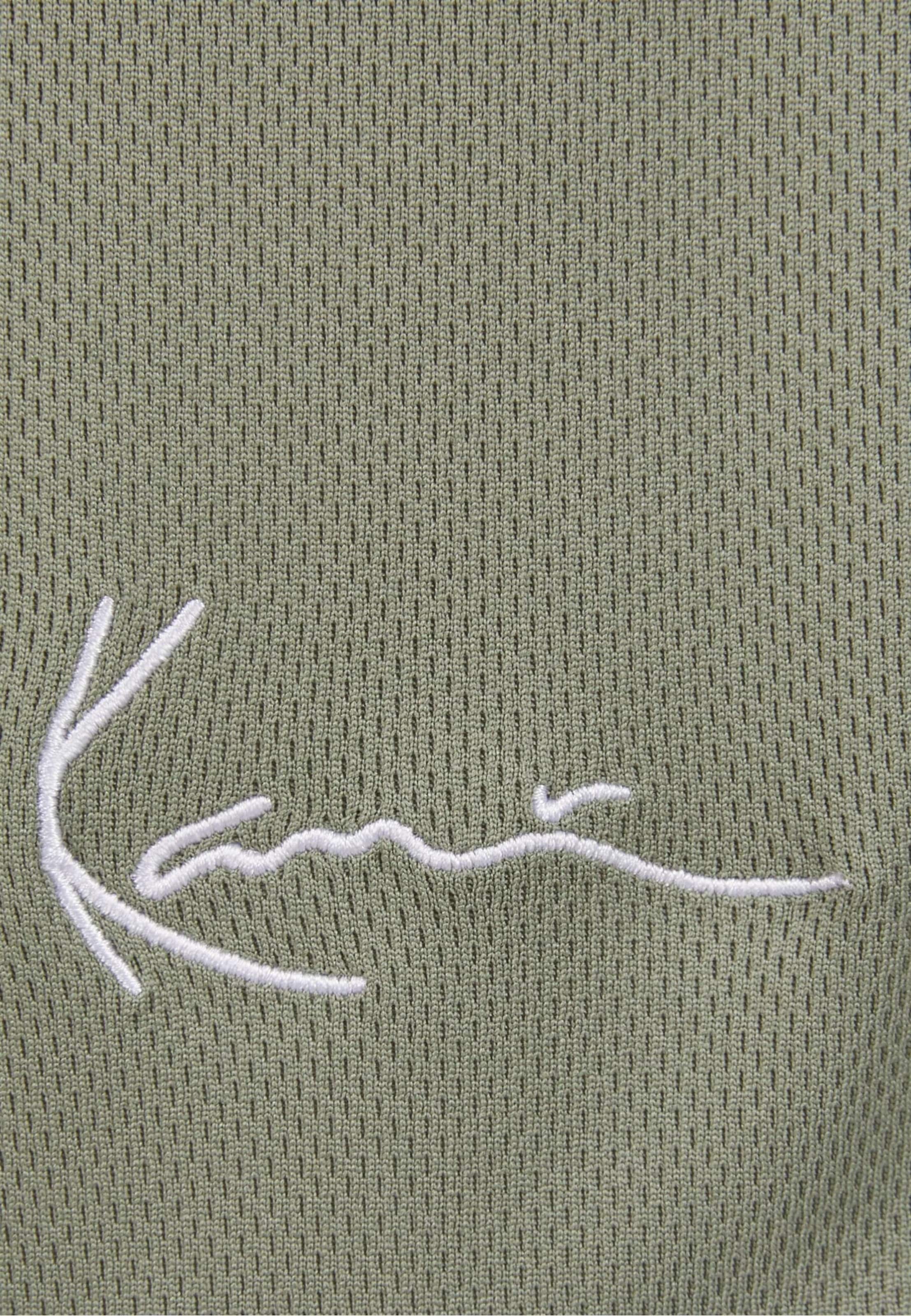 Karl Kani Regular Pants ' ' in Green