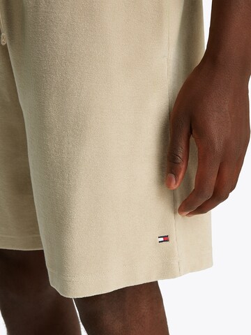 TOMMY HILFIGER - Regular Calças em castanho