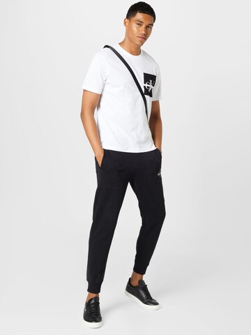 Calvin Klein Jeans Tapered Byxa i svart