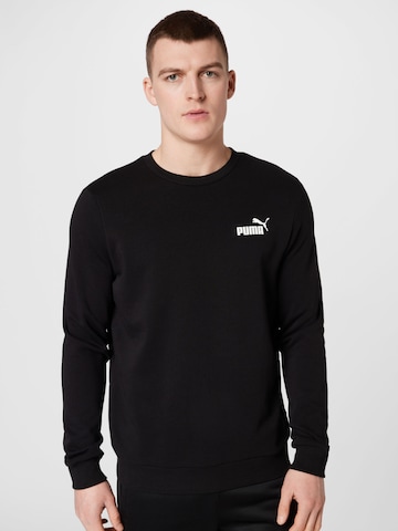 PUMA Sportsweatshirt 'Essentials' in Zwart: voorkant