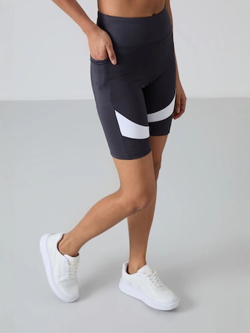 Tommy Life - Tapered Leggings 'Gamaschen' em mistura de cores