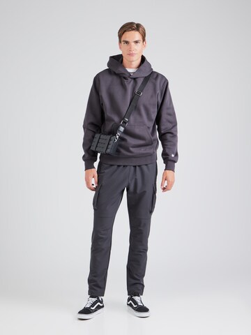 regular Pantaloni sportivi di Champion Authentic Athletic Apparel in nero