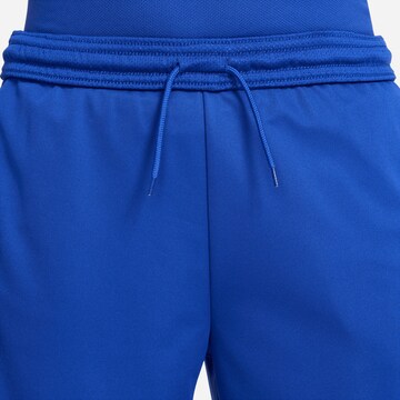 NIKE Normalny krój Spodnie sportowe w kolorze niebieski