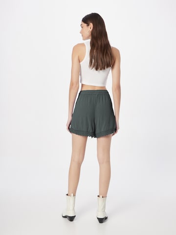 ABOUT YOU Loose fit Pants 'Dorina' in Green