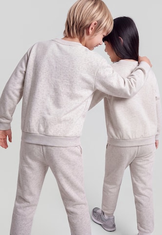 Nike Sportswear Jogging ruhák 'ESSENTIAL' - bézs: hátul