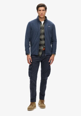 Veste en polaire Superdry en bleu : devant