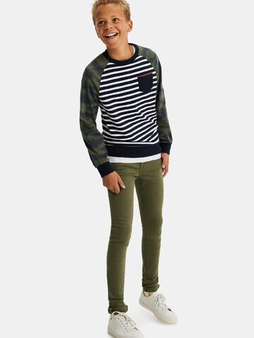 Skinny Jeans di WE Fashion in verde