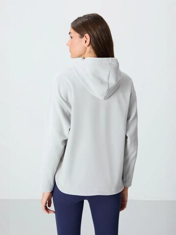 Tommy Life Pullover in Grau